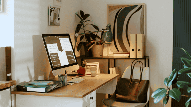 A high-end minimalist walnut desk setup featuring a modular wooden desktop organizer, a grey felt desk mat, and a clean workspace designed for deep work productivity.